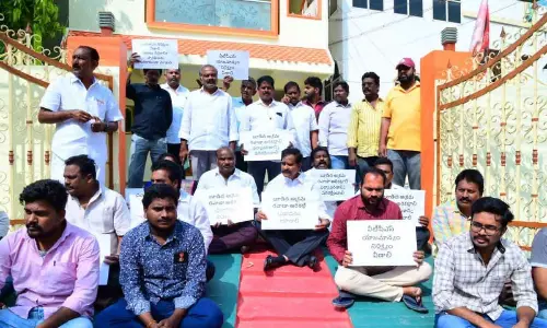Former  Minister Devineni  Uma Maheswara Rao staging a dharna at his residence on Thursday