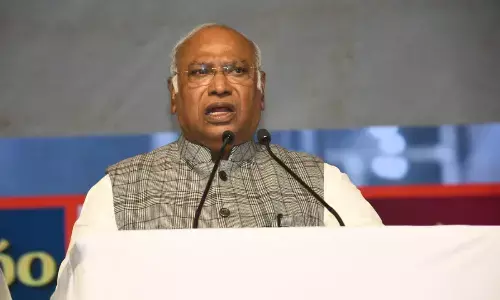 Let KCR confine himself to farm house : Kharge