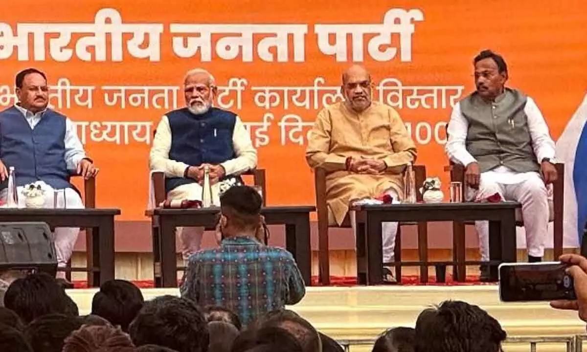 Prime Minister Narendra Modi with Union Home Minister Amit Shah and BJP National President JP Nadda during the Deepawali Milan event in New Delhi on Friday