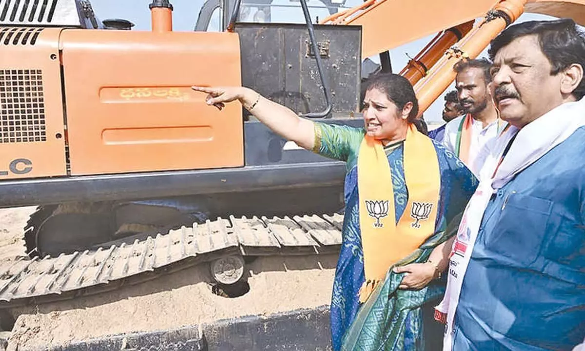 BJP state president Daggubati Purandeswari inspects a sand ramp at Burrilanka in Kadiyam mandal East Godavari district on Saturday.  Jana Sena Party district president K Durgesh and others also seen.