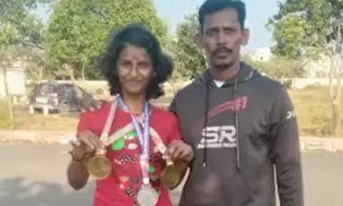 Ponnada Hasini  displaying a bunch of medals won recently in the roller skating competition.