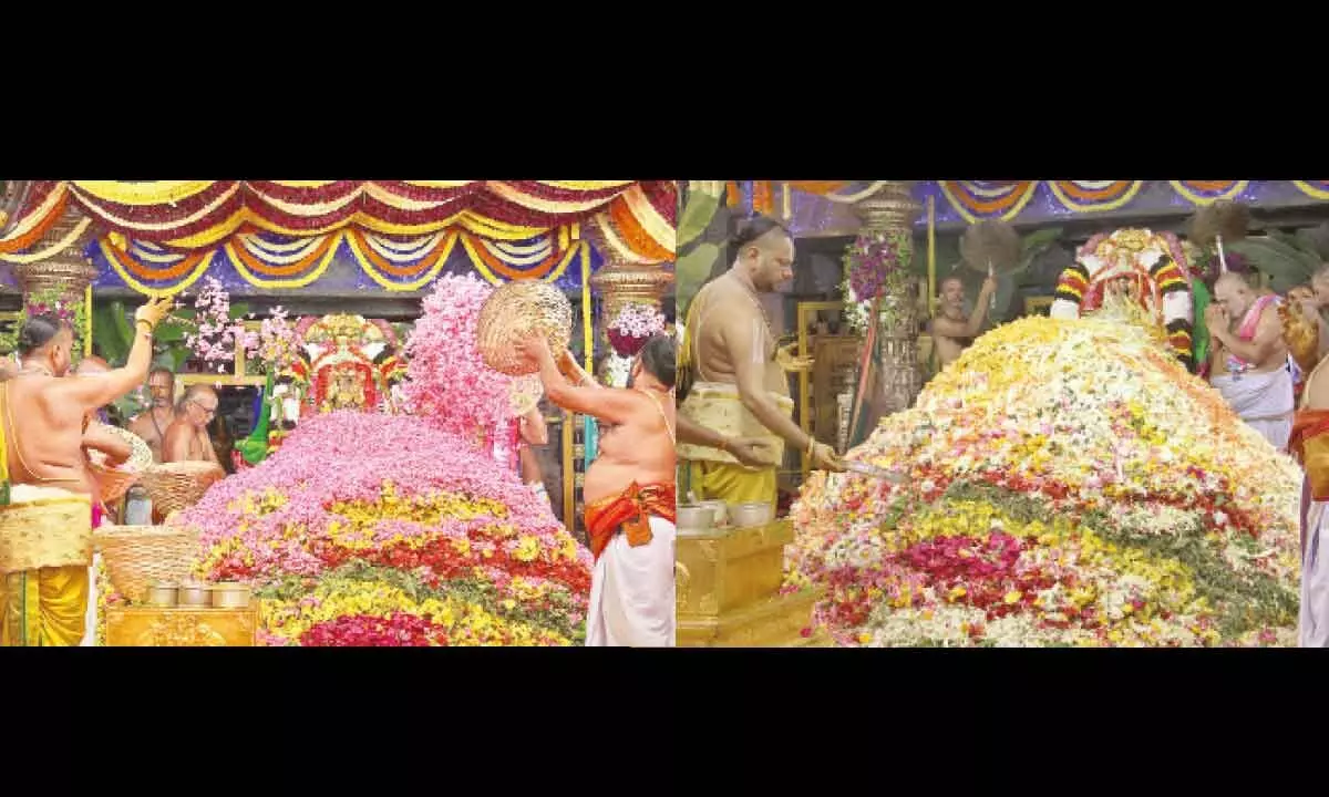 Priests offering variety of flowers to Goddess Padmavathi as part of Pushpayagam at Tiruchanur on Sunday