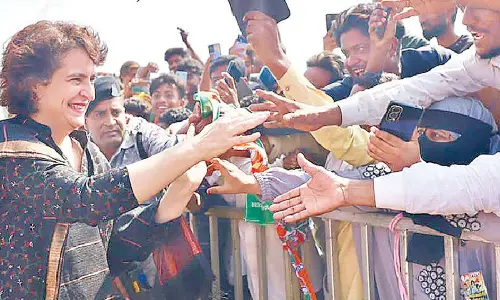 AICC general secretary Priyanka Gandhi Vadra greeting the people in Asifabad on Sunday