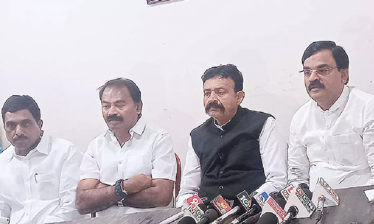 Deputy Chief Minister Amjad Bhasha addressing the media at his camp office in Kadapa on Monday. ZP chairman A Amarnath Reddy, Kadapa Mayor Suresh Babu and others are also seen.