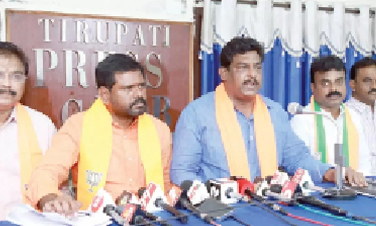 BJP State secretary S Muni Subramanyam addressing the media in Tirupati on Tuesday. Party  leaders Dr D Sreehari Rao, Samanchi Srinivas and others are also seen.