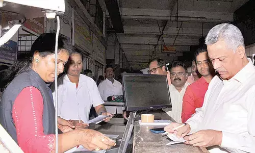 APSRTC MD Dwaraka Tirumala Rao booking Cargo parcel at PNBS in Vijayawada on Monday