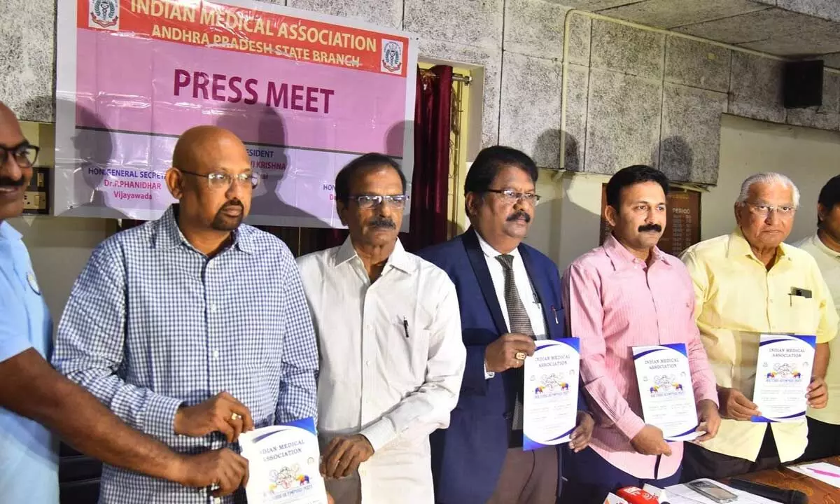 Indian Medical Association AP committee members announcing the details of National-Level Doctors Sports at a press conference in Vijayawada on Tuesday ( Hans photo Ch Venkata Mastan )
