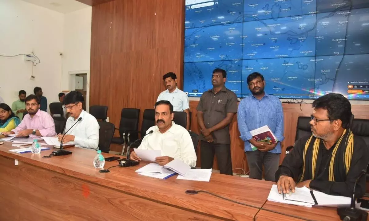 Agriculture Minister Kakani Govardhan Reddy addressing the officials at an emergency at the Collectorate in Nellore on Wednesday