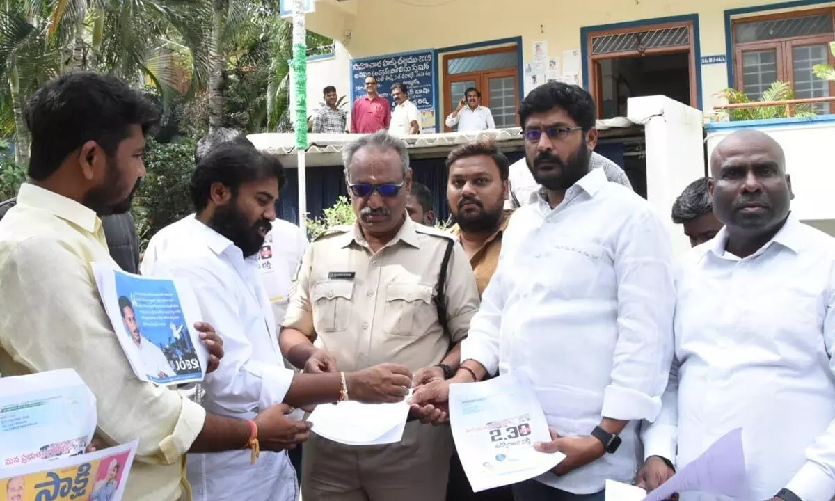 Telugu Yuvatha leaders submitting a complaint to police personnel at Alipiri police station in Tirupati on Wednesday