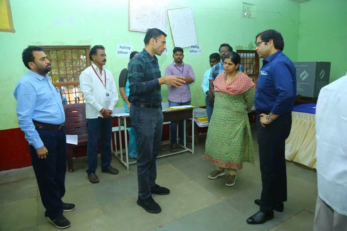 Election observer and DEO inspects Postal Ballot Facilitation centre in Mulugu