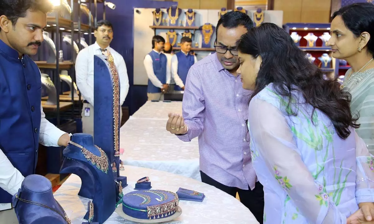 Visitors browsing through the collection of jewellery at the exhibition organised by Vaibhav Jewellers in Visakhapatnam on Saturday