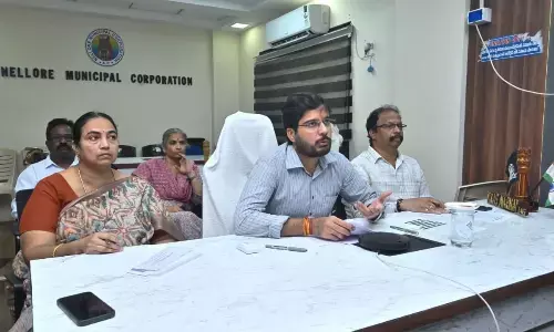Municipal Commissioner  Vikas Marmath addressing a virtual meeting with the  officials over ‘Adudam Andhra’ programme, in  Nellore on Saturday