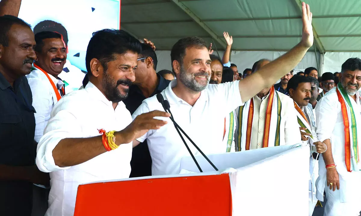 Senior Congress leader Rahul Gandhi with TPCC chief and party Kamareddy candidate Revanth Reddy at an election meeting in Kamareddy