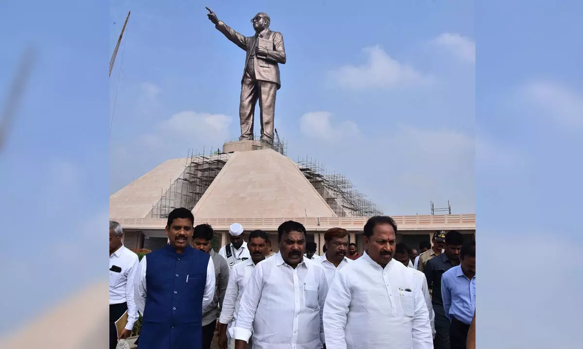 Ministers M Nagarjuna, Kottu Satyanarayana, NT R district collector S Dilli Rao and others inspect Dr B R Ambedkar statue in Vijayawada on Monday