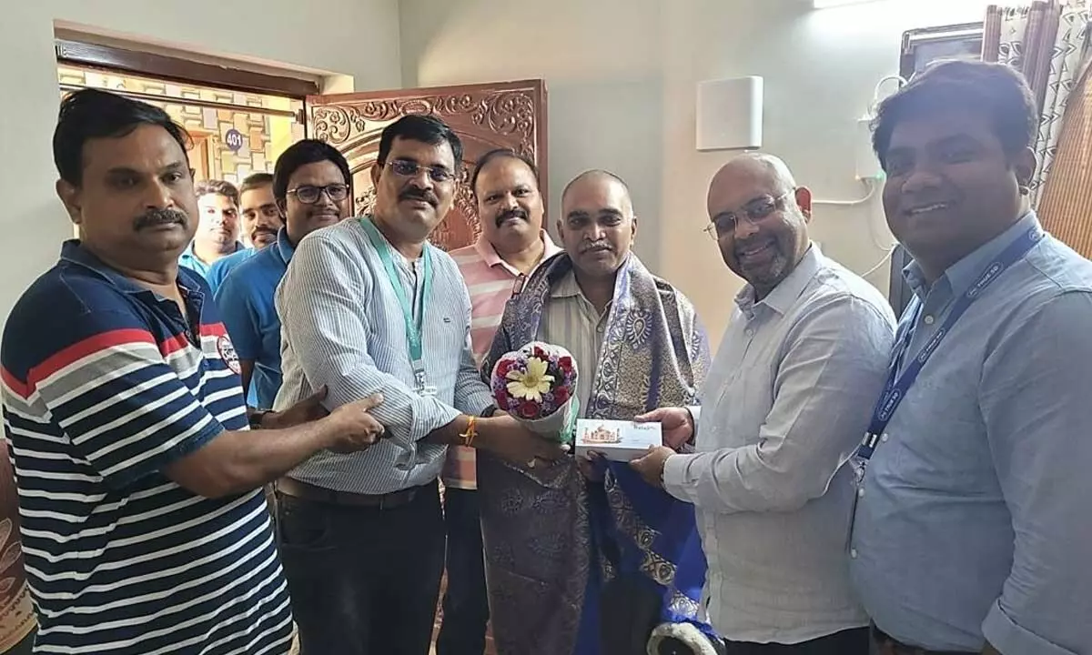 CEO of AP region Mahesh Kumar handing over the first JioAirFiber connection to a customer in Vijayawada on Monday
