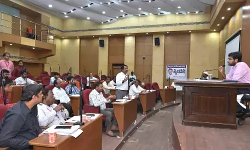 Municipal Commissioner Vikas Marmat addressing the bankers at a meeting in Nellore on Monday