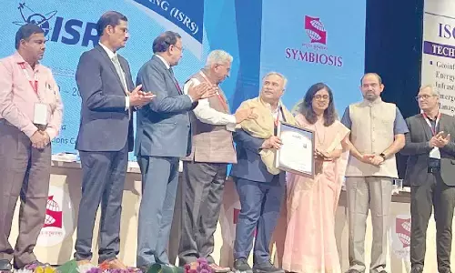 Prof Manoj K Arora, vice-chancellor of SRM -AP receiving the award at Pune