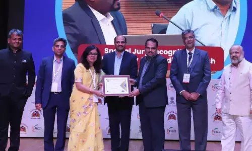 Dean (Academic Affairs) Dr Vinayak Kalluri and Associate Dean Dr Karthik Rajendran receiving FICCI HEE award on behalf of SRM University-AP in New Delhi on Wednesday