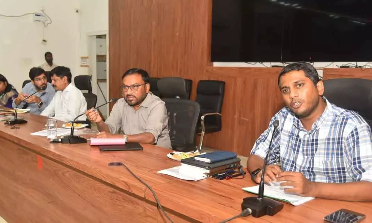 Electoral roll observer P Bhaskar addressing the officials at a meeting along with district Collector M Harinarayanan at the Collectorate in Nellore on Saturday   
