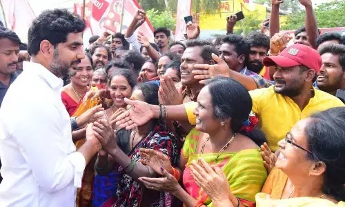 Women greet TDP national general secretary Nara Lokesh on his netry into Pithapuram as part of his Yuva Galam padayatra in Kakinada district on Saturday