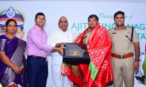 DGP K V Rajendranath Reddy being felicitated by Central MLA Malladi Vishnu and VMC Commissioner Swapnil Dinkar Pundkar in Vijayawada on Saturday