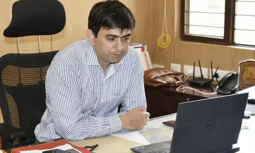 Alluri Sitarama Raju District Collector Sumit Kumar speaking to sectoral officers over a video-conference on Saturday