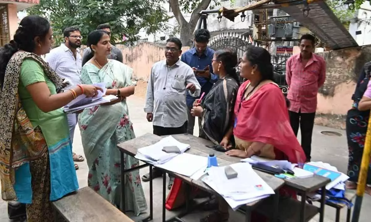 District Collector Dr K Madhavi Latha inspecting voter registration special camp at Innespeta in Rajamahendravaram on Sunday