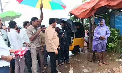 Nellore MP Adala Parabhakar Reddy visited Indiramma coloney in nellore city  inundated in the water on Monday.