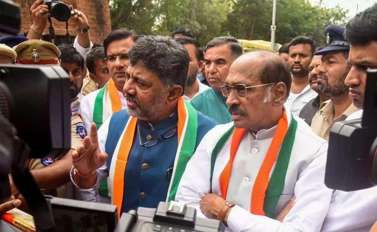 Congress leaders D.K. Shivakumar and Manikrao Thakre speak with the media after the Congress Legislature Party (CLP) meeting, in Hyderabad on Monday