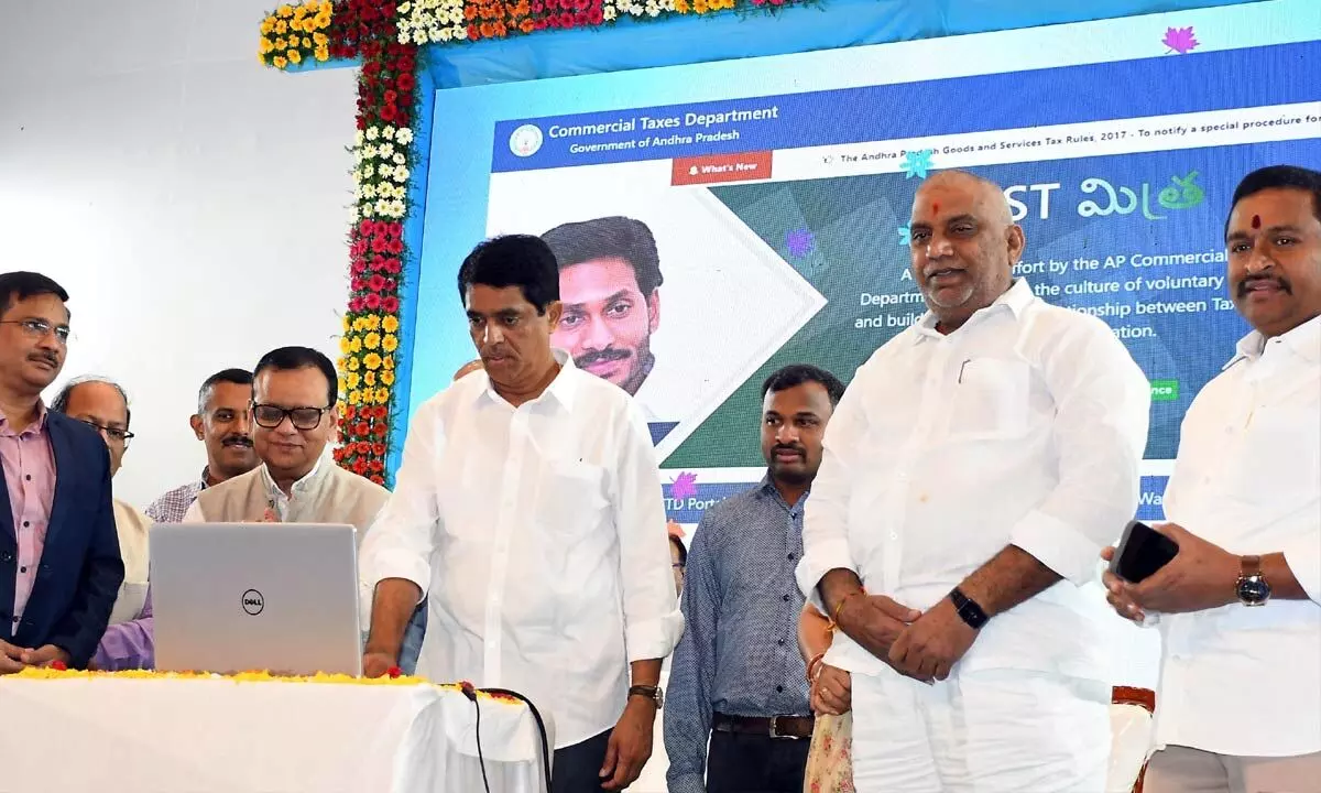 Minister for finance Buggana Rajendranath Reddy and other official releasing a Logo on Vision, mission and values of the commercial-tax department at Thummallapalli Kallakshetram in  Vijayawada on Monday. Photo: Ch Venkata Mastan