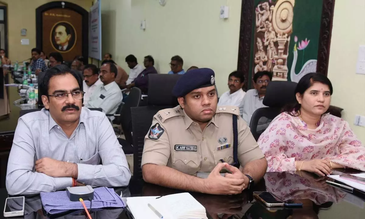 District Collector M Venugopal Reddy holding a video- conference with officials in Guntur on Monday. SP K Arif Hafeez and Joint Collector G Rajakumari are also seen.