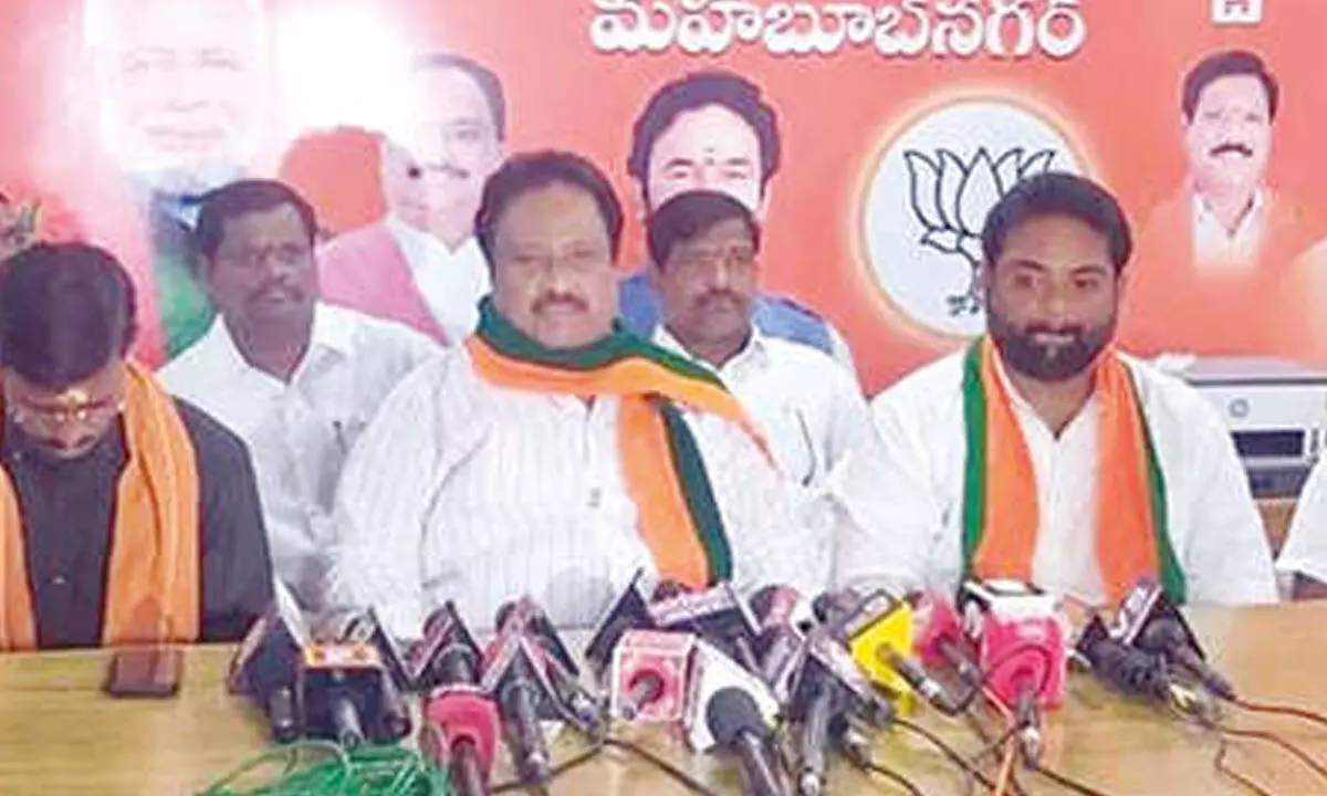 BJP National Executive Member along with BJP Mahabubnagar Assembly contestant Mithun Reddy addressing media in Mahabubnagar on Modnay