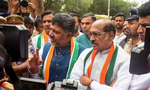 Congress leaders D.K. Shivakumar and Manikrao Thakre speak with the media after the Congress Legislature Party (CLP) meeting, in Hyderabad on Monday