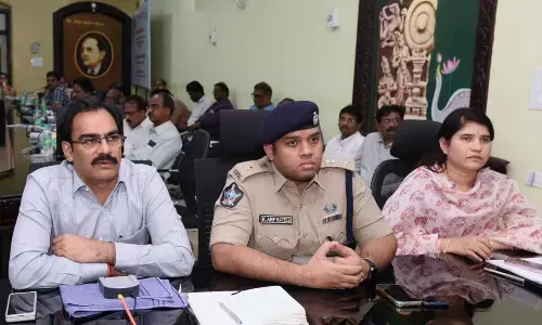 District Collector M Venugopal Reddy holding a video- conference with officials in Guntur on Monday. SP K Arif Hafeez and Joint Collector G Rajakumari are also seen.