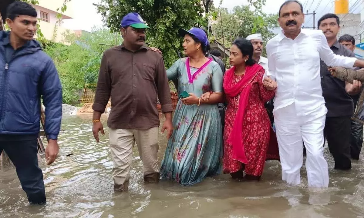 City MLA Bhumana Karunakar Reddy,municipal  Commissioner D Haritha and others visiting the  rain-affected areas in Tirupati on Tuesday
