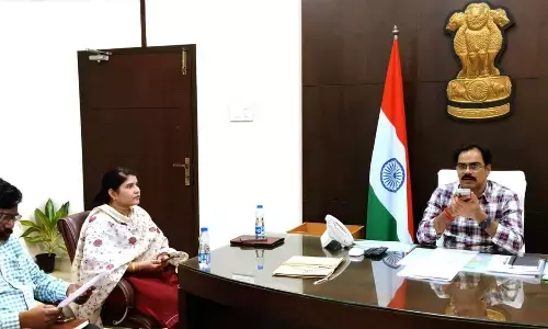 Collector M Venugopal Reddy holding a teleconference with officials in Guntur on Tuesday. Joint collector G Rajakumari, district revenue officer K Chandrasekhara Rao are also seen