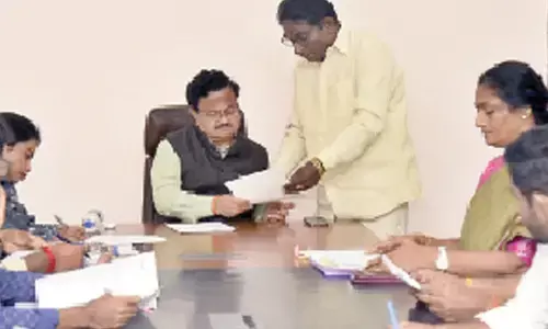 District collector K Venkataramana Reddy speaking at a meeting of political parties’ representatives in Tirupati on Tuesday