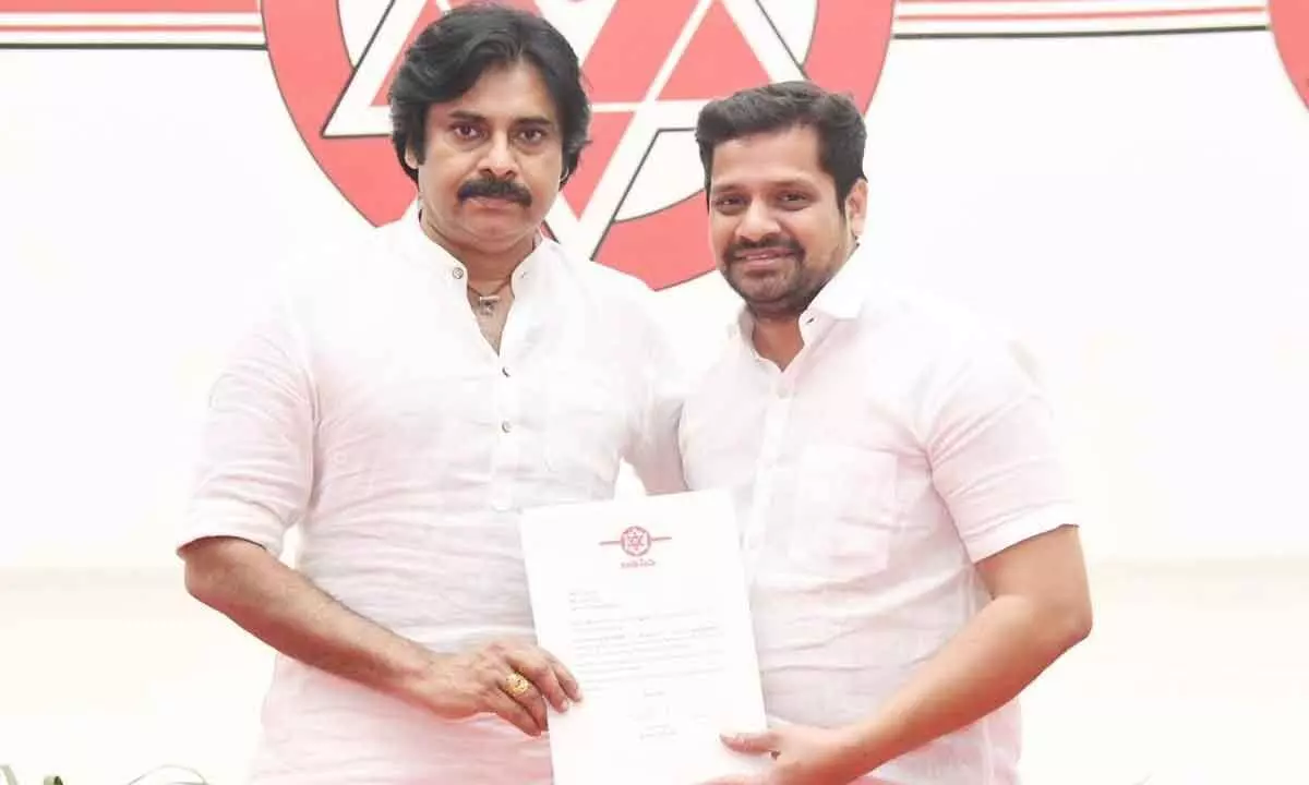 Jana Sena Party chief Pawan Kalyan handing over letter appointing Bunny Vasu as chairman of propaganda wing of the party at party office in Mangalagiri on Thursday