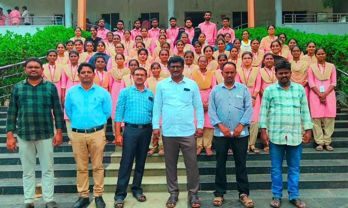 Students who secured jobs in the placement drive with Technical Director Dr K Vijaya Srinivas and faculty at Prakasam Engineering College at Kandukuru on Thursday