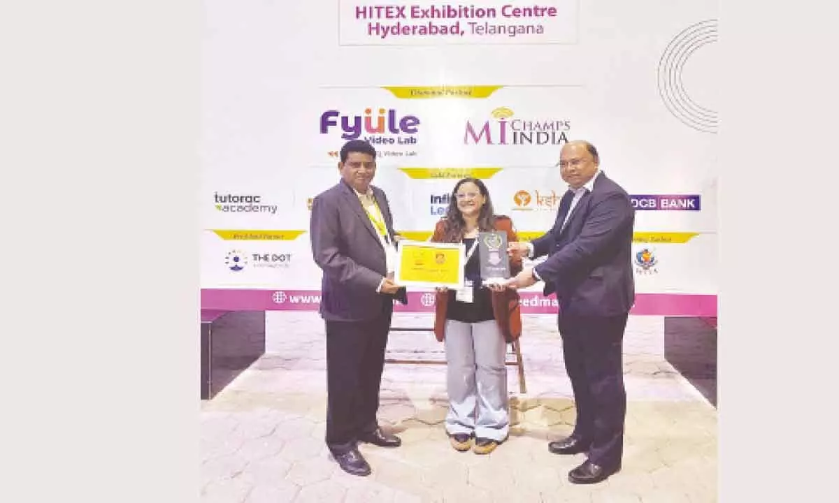 Kindertown Preschool and Daycare Director Zainab Noor receiving ‘Brainfeed Top 100 Preschools of India’ award at a programme at HITEX Exhibition Centre in Hyderabad on December 16