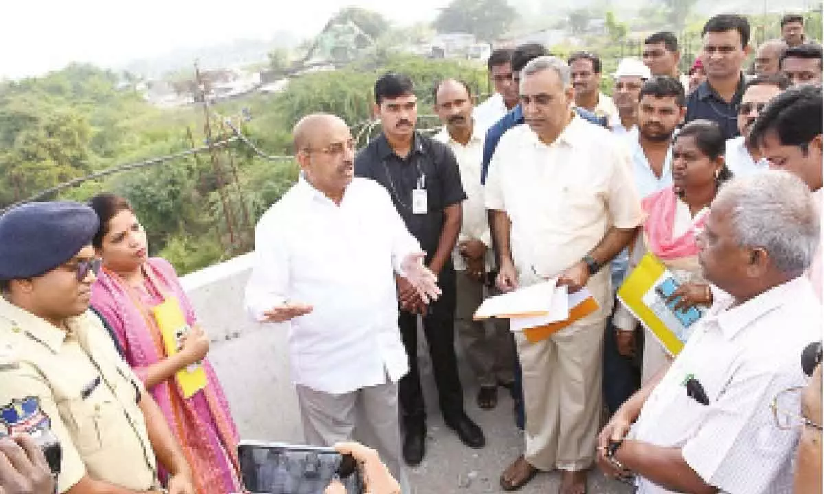 Minister Tummala Nageswara Rao inspecting the second bridge construction works in  Bhadrachalam on Sunday.