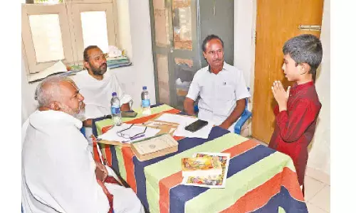 A student participating in Bhagavad Gita recital competition at Annamacharya Kalamandiram in Tirupati on Sunday