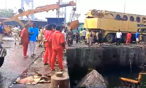 Drowned boats taken out from Fishing Harbour