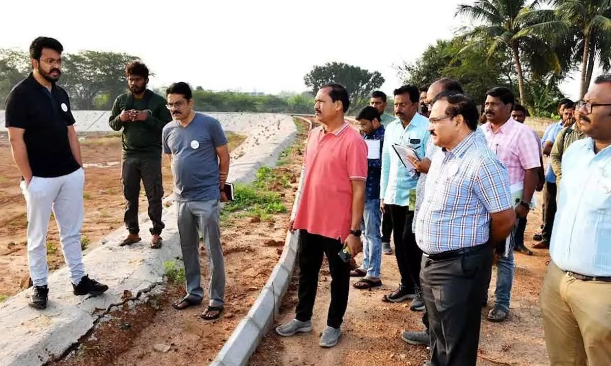 GVMC Commissioner CM Saikanth Varma directing officials to improve ponds in Visakhapatnam