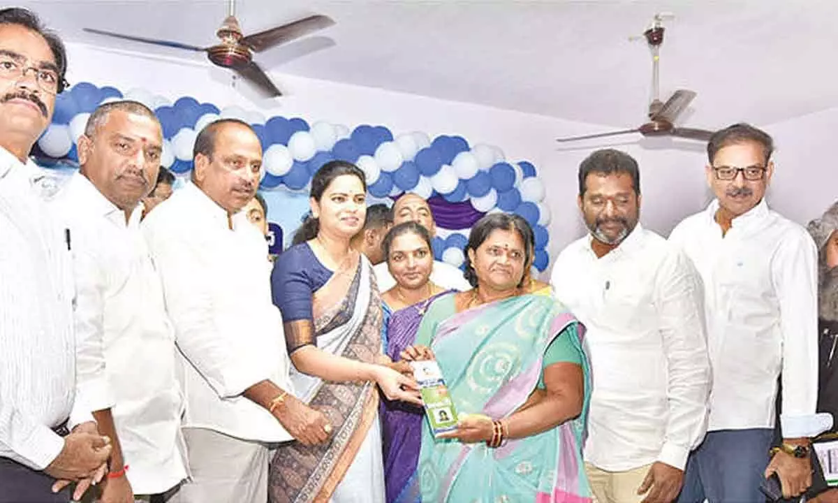 Minister Vidadala Rajini distributing upgraded YSR Aarogyasri Smart Health Cards in Guntur on Tuesday. Collector M Venugopal Reddy, MLC Lella Appi Reddy, mayor Kavati Siva Naga Manohar Naidu are also seen.