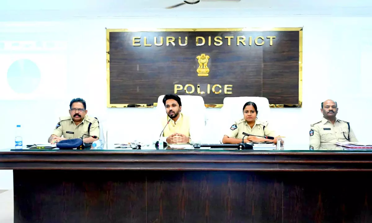 Collector Prasanna Venkatesh speaking at a review meeting in Eluru on Tuesday. SP Mary Prasanti is also seen.