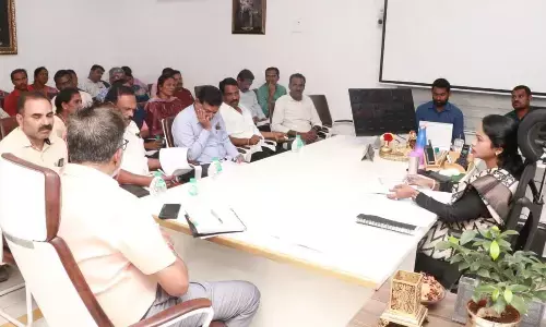Municipal Commissioner D Haritha holding a meeting with officials in Tirupati on Tuesday