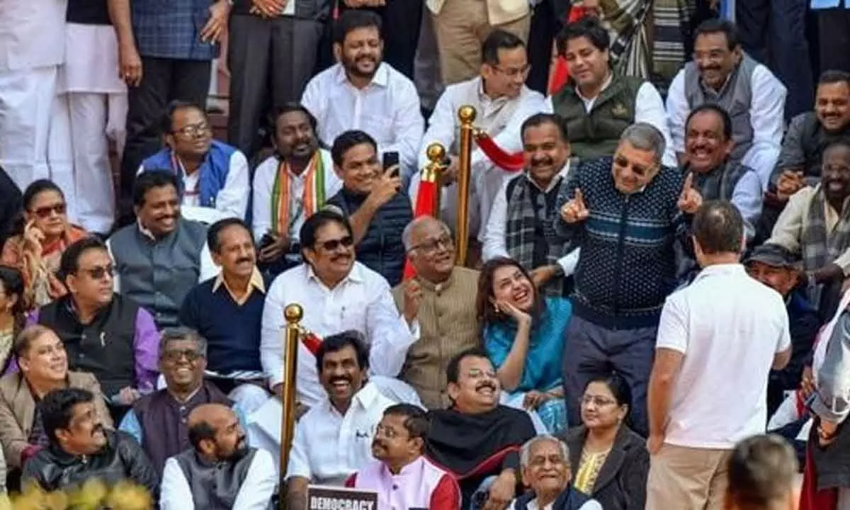 TMC MP Kalyan Banerjee appears to be mimicking Rajya Sabha Chairman Jagdeep Dhankhars mannerisms during a protest with suspended Opposition MPs at the Makar Dwar.