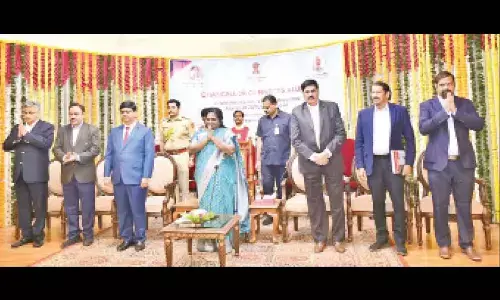 Governor Tamilisai felicitates JNTUH alumni