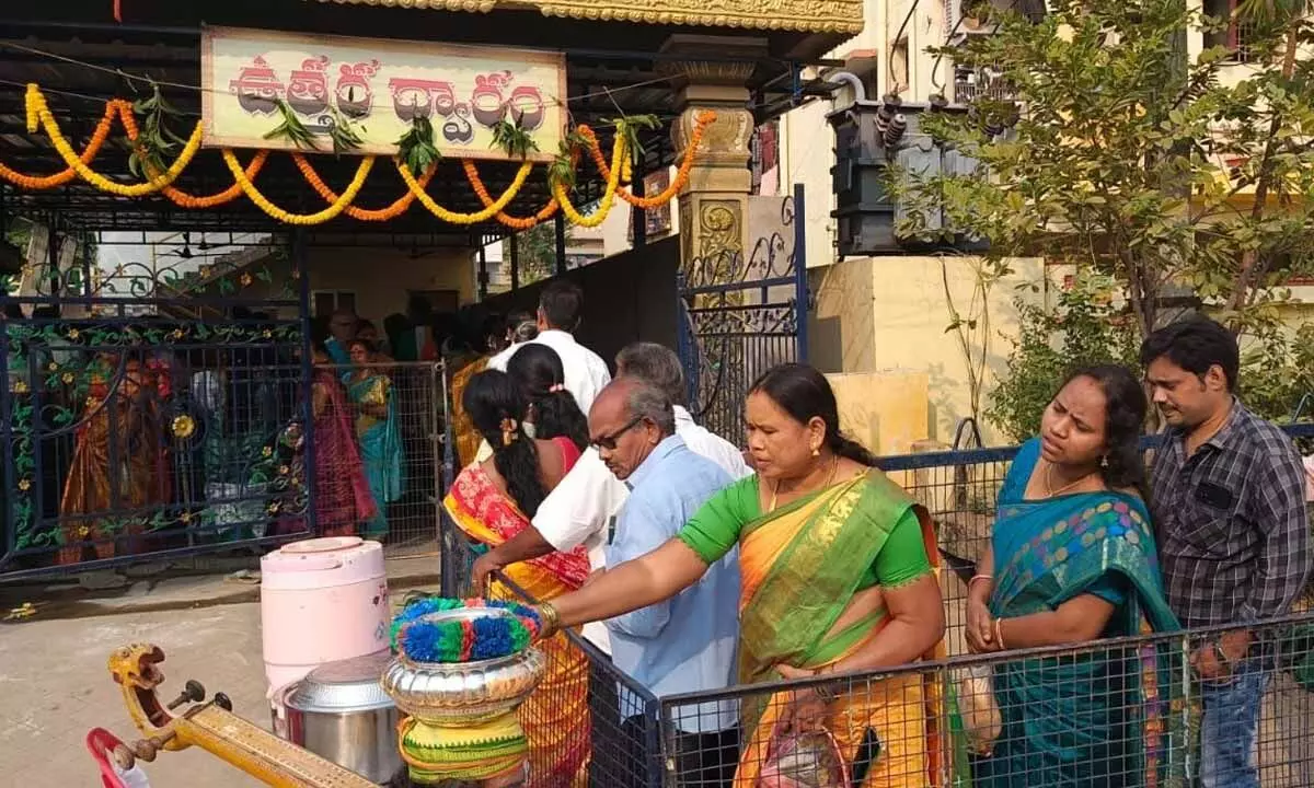 Devotees in queue lines at Balajinagar temple on Saturday